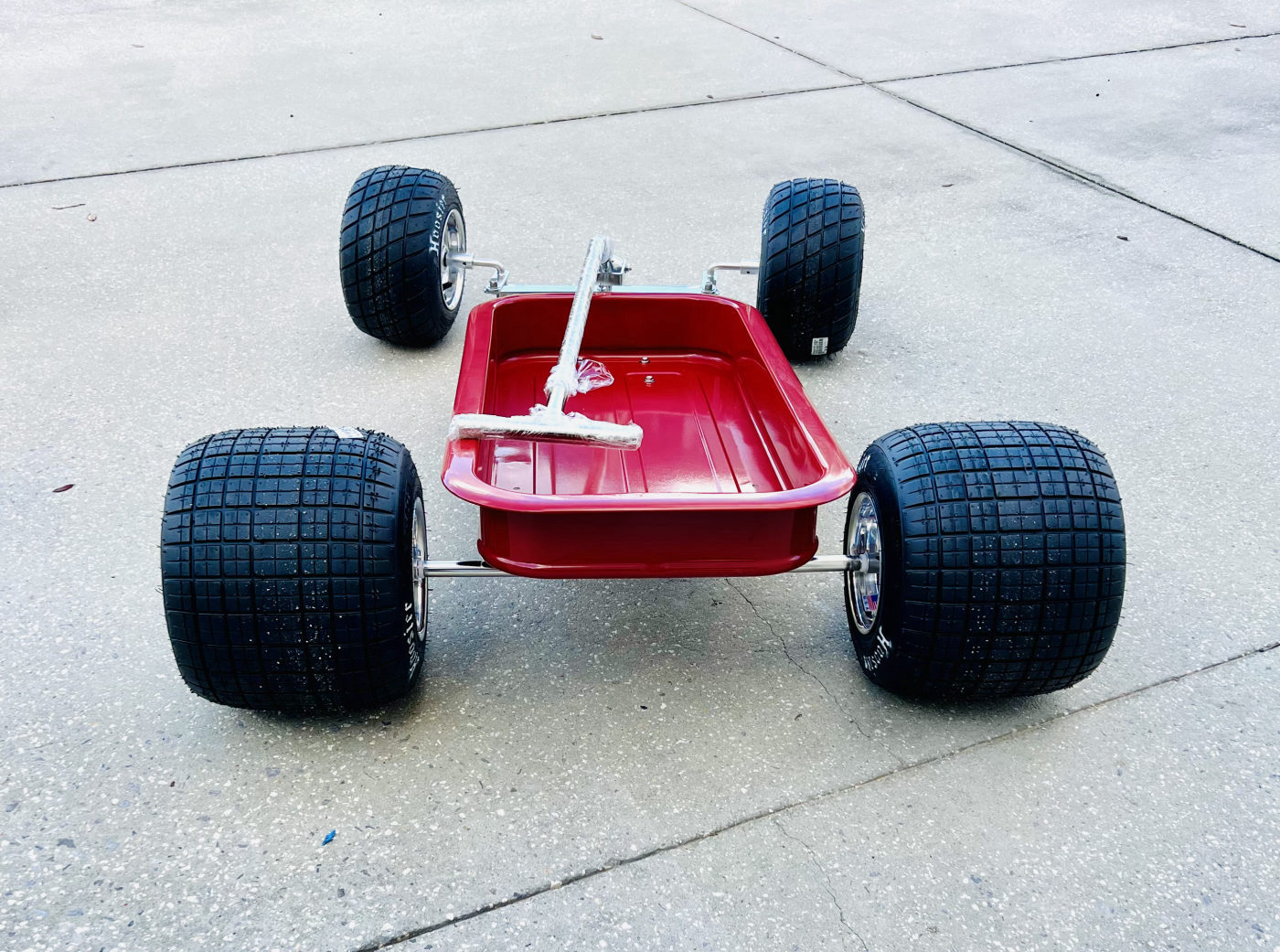 DKCC Hot Rod Flyer — rear three-quarter view showing Hoosier slicks and fabricated rear axle