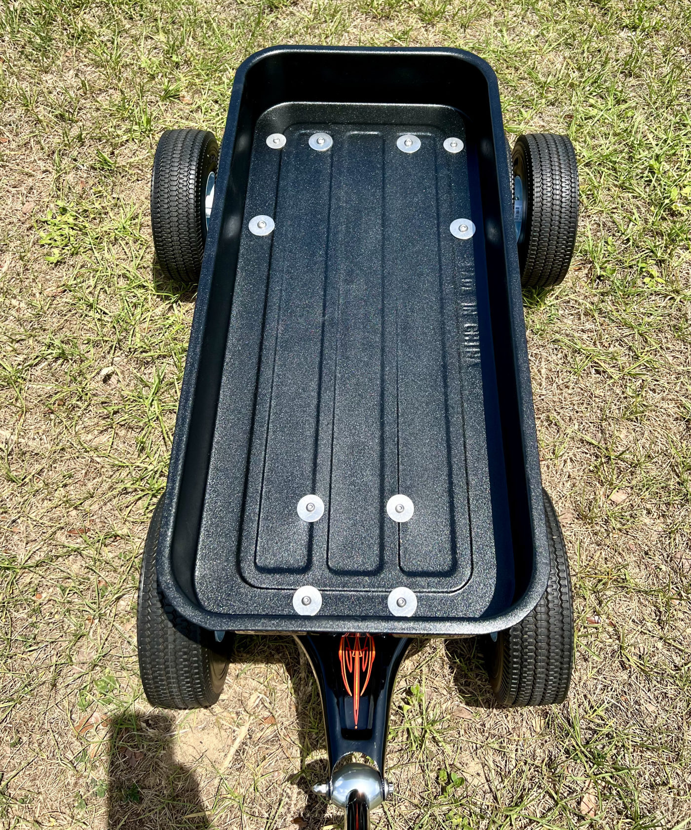 DKCC Blacktop Flyer — overhead bed view showing custom floor panel and hardware