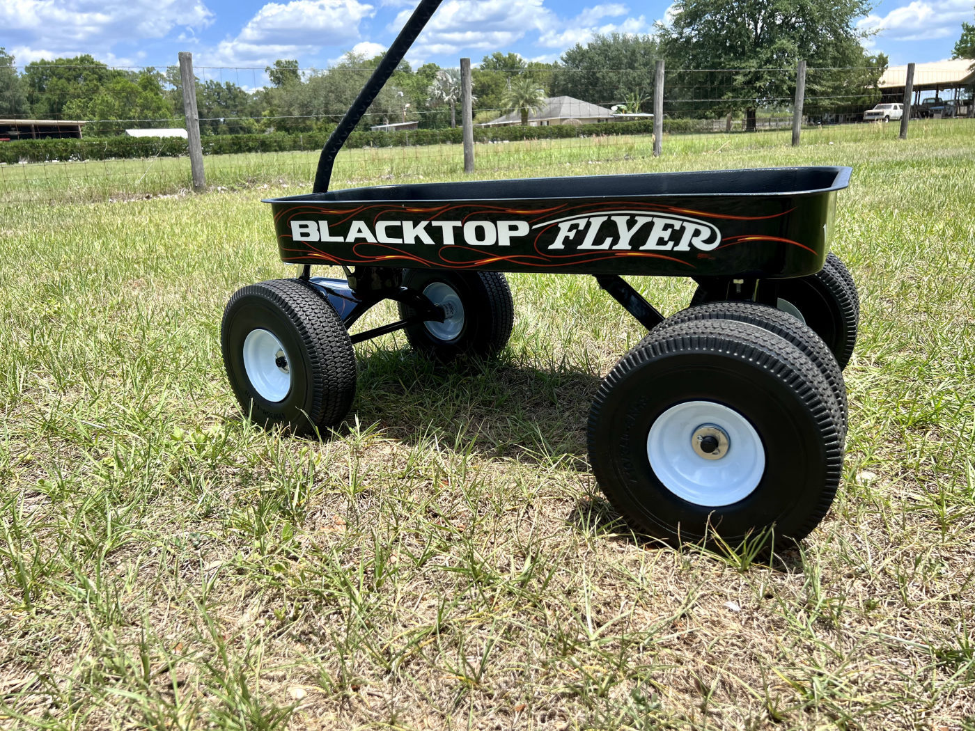 DKCC Blacktop Flyer — low side profile showing full stance and Blacktop Flyer flame graphics