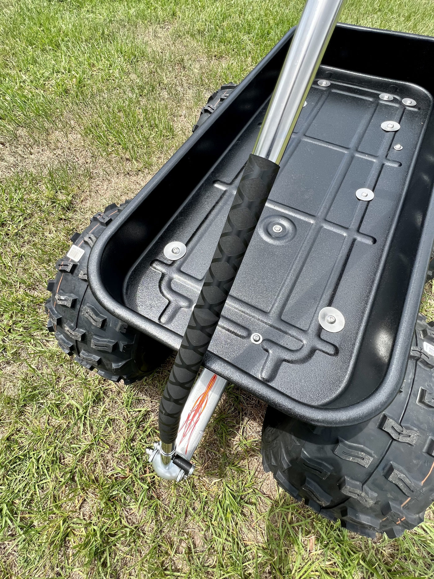 DKCC Bigfoot Flyer — outdoor side view showing full stance and Maxxis ATV tires