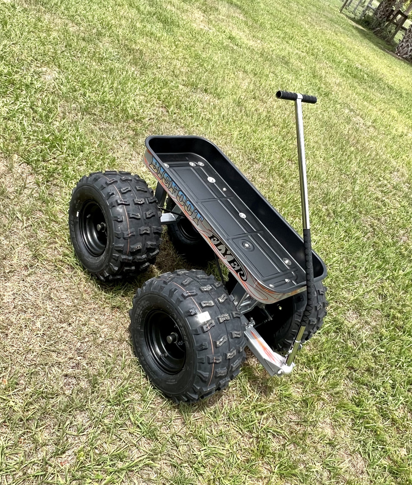 DKCC Bigfoot Flyer — front view showing wide stance and chrome push handle